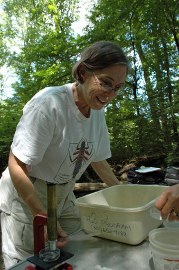 3 - Team leader Cathy Wiss sets out the collecting pans